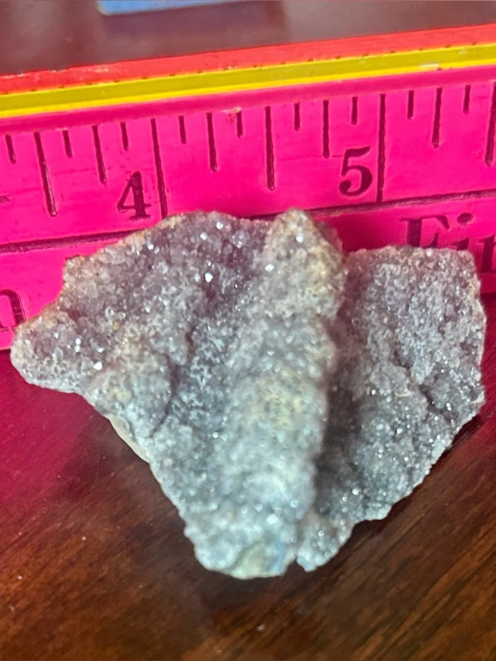 Small black amethyst in shape of firefly